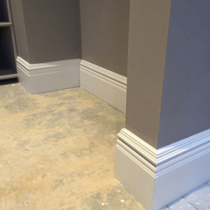sticking skirting to a wall with skirting board adhesive glue