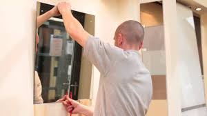 installing a mirror with a mirror adhesive glue